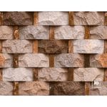 Stacked beige and brown stone veneer wall with rectangular blocks and vertical joints.